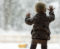 Blond toddler looking out window at snow | How much does a new furnace cost in Indianapolis | Homesense